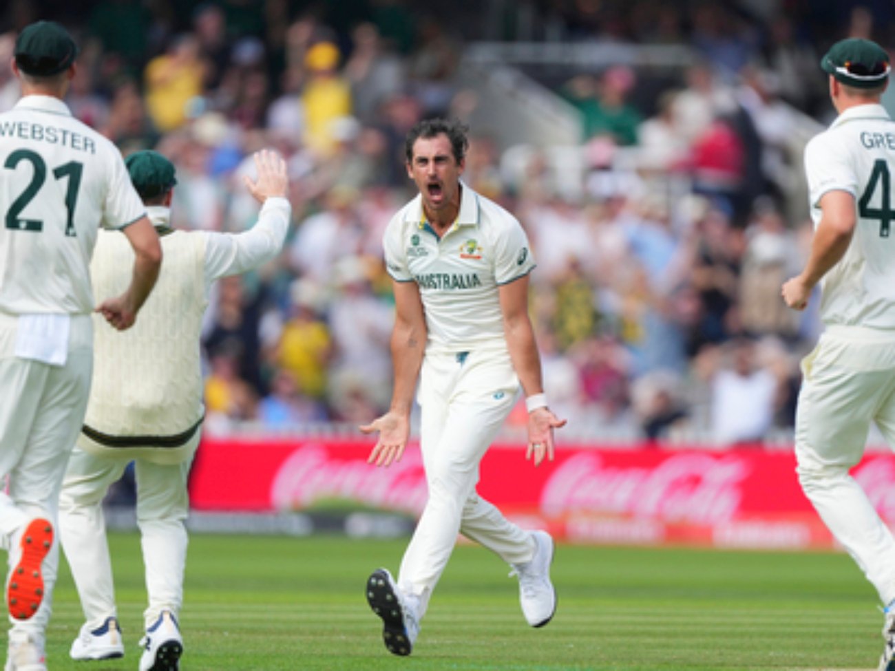 Australia's Mitchell Starc celebrates the dismissal of South Africa's Aiden Markram during the World Test Championship final between South Africa and Australia at Lord's cricket ground in London, Wednesday, June 11, 2025. (AP Photo/Kirsty Wigglesworth)