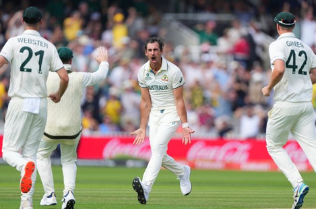Australia's Mitchell Starc celebrates the dismissal of South Africa's Aiden Markram during the World Test Championship final between South Africa and Australia at Lord's cricket ground in London, Wednesday, June 11, 2025. (AP Photo/Kirsty Wigglesworth)
